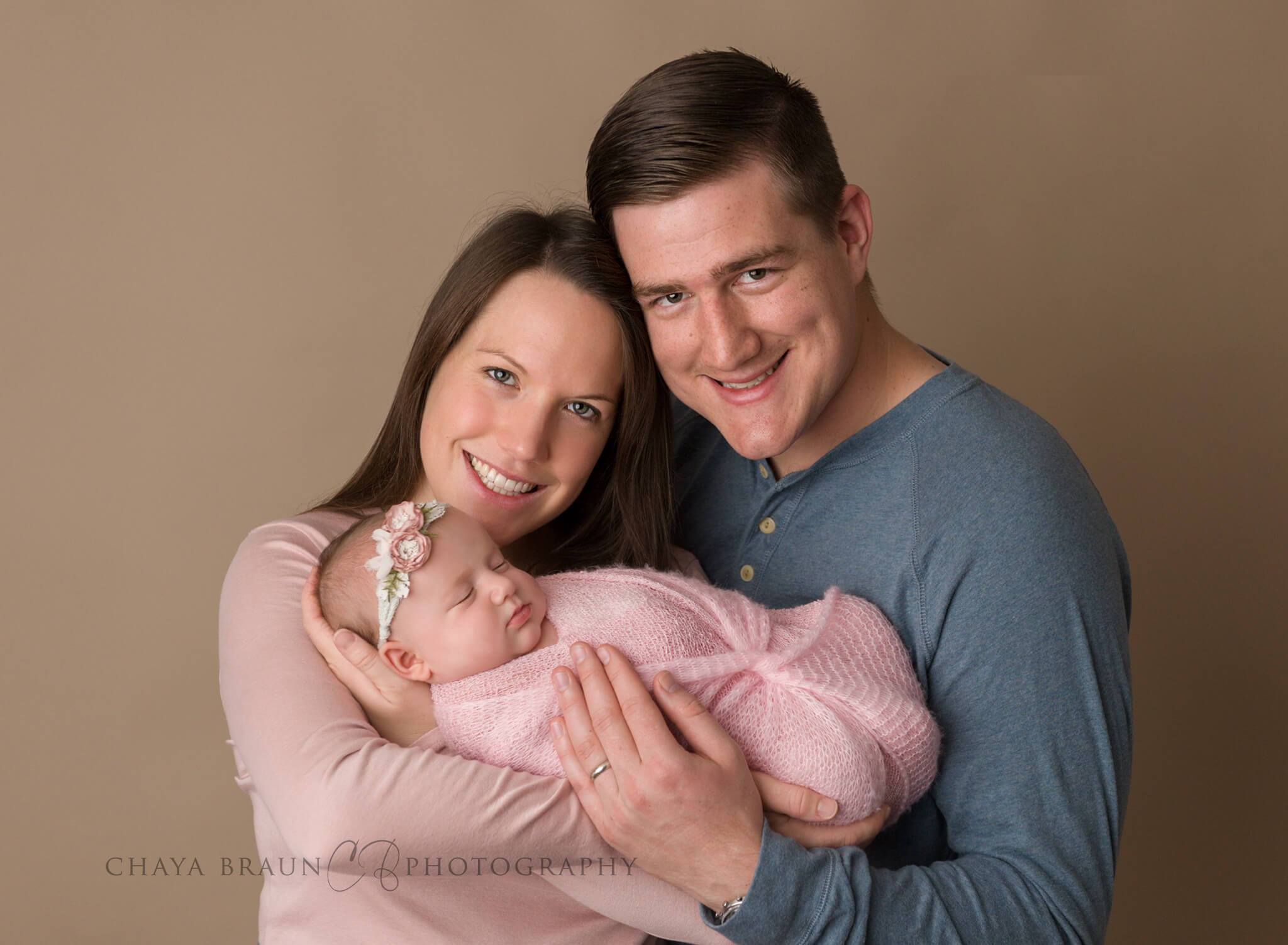 newborn baby and parents professional photo