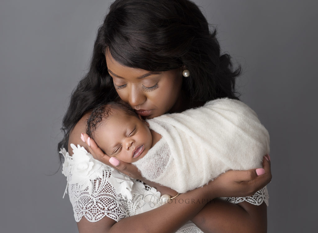 newborn and mother portrait